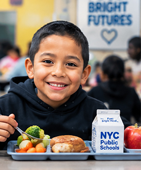 Student enjoying a healthy school lunch